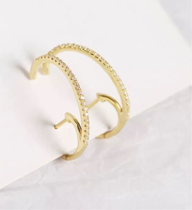 Mono boucles d'oreilles avec pierres de zircone